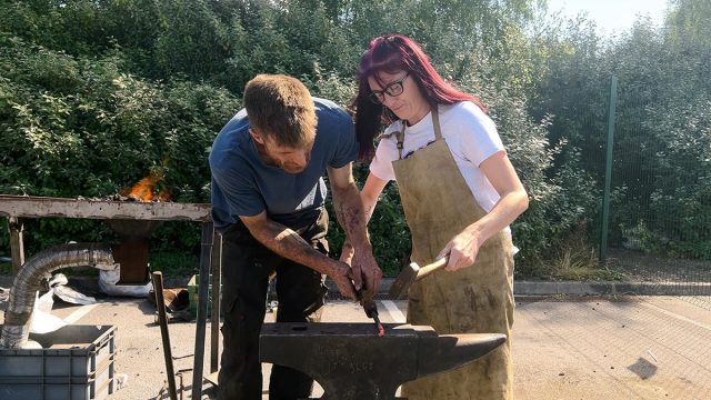 Lady tries iron mongery