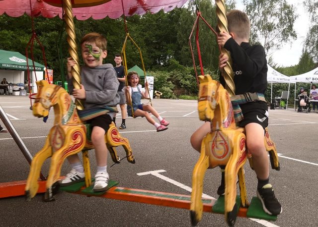 Children on carousel
